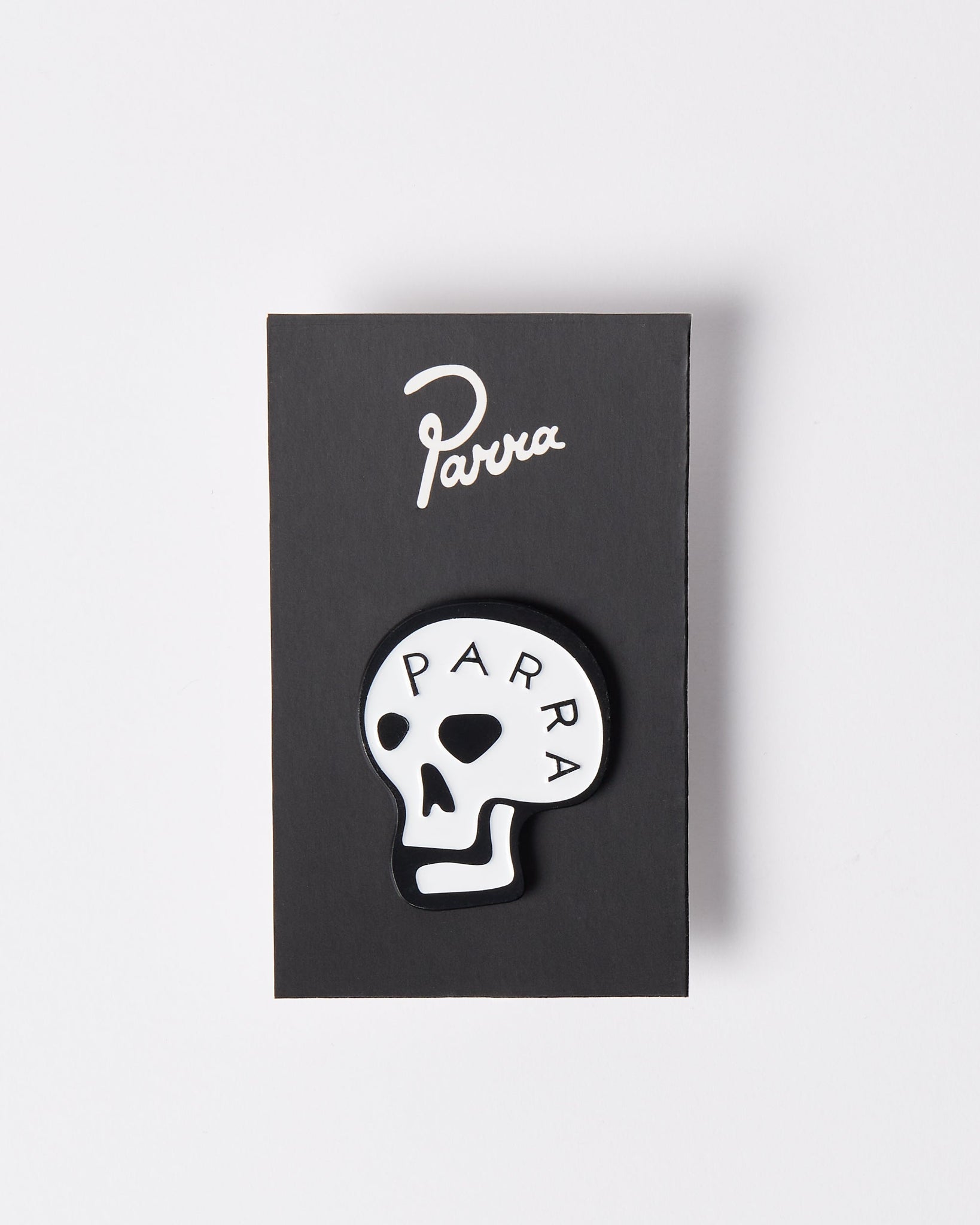 Skulled enamel pin