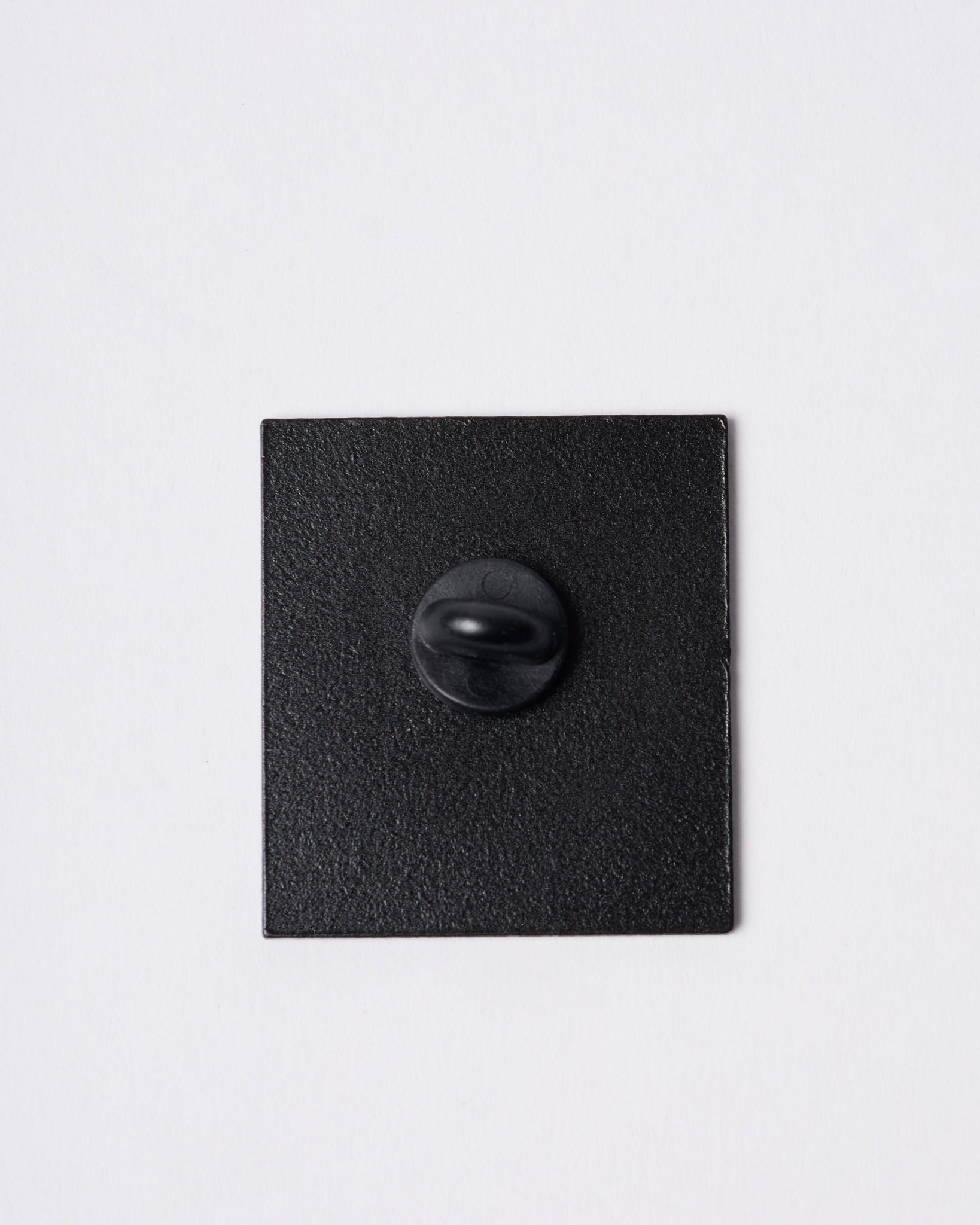 Nothing face enamel pin