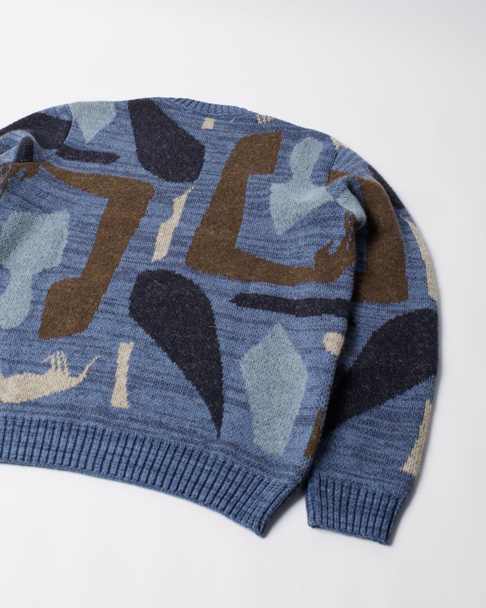 Detached knitting pullover